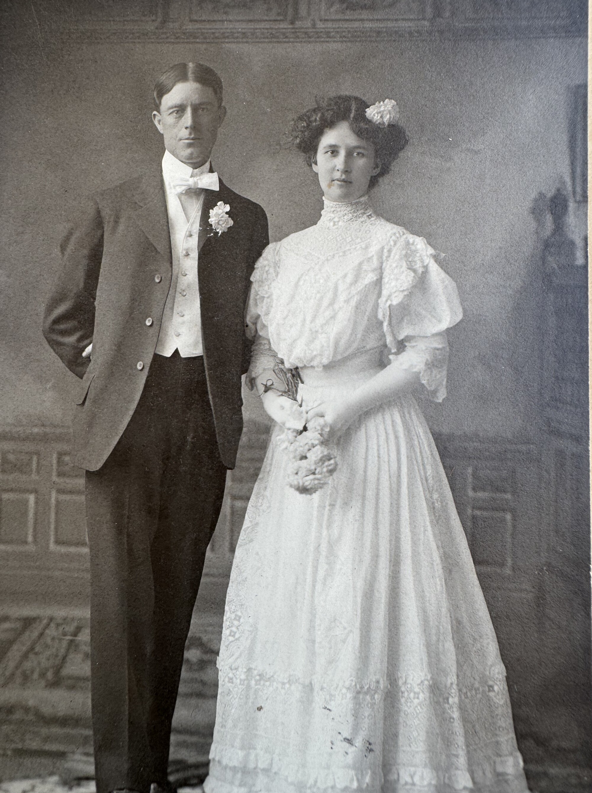 Wedding portrait of a bride and groom in a studio